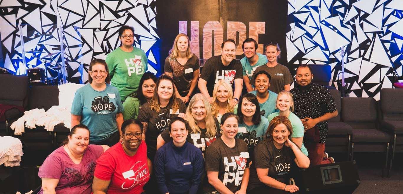 HOPEmatch volunteers gathered together at a community event.